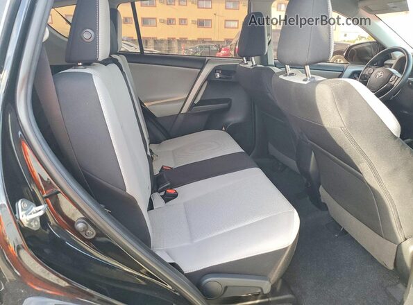 2T3WFREV7JW517682 2018 TOYOTA RAV4 Black Rear interior view