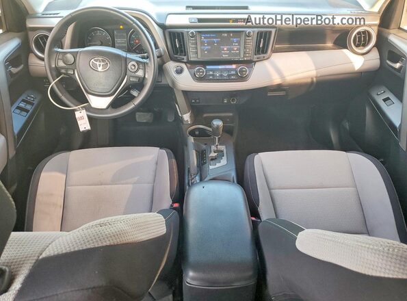 2T3WFREV7JW517682 2018 TOYOTA RAV4 Black Dashboard view