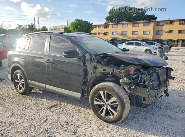 2T3WFREV7JW517682 2018 TOYOTA RAV4 Black Front right