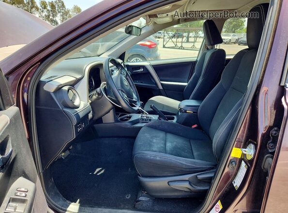 2T3WFREV8GW264171 2016 TOYOTA RAV4 Purple წინა სალონის ხედი