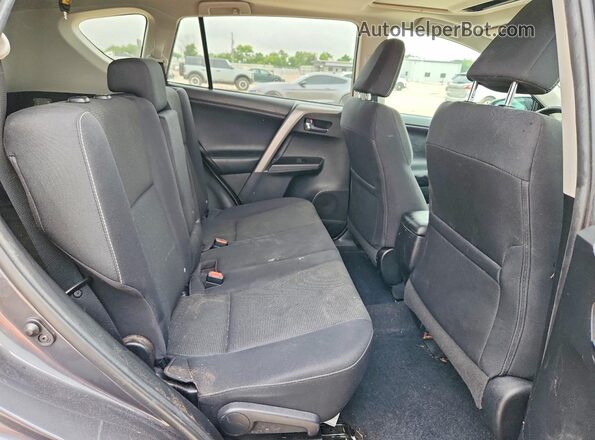 2T3WFREV8HW389804 2017 TOYOTA RAV4 Gray Vista interior trasera