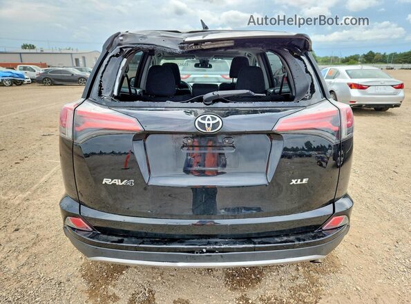 2T3WFREV8JW411242 2018 TOYOTA RAV4 Black უკანა ხედი