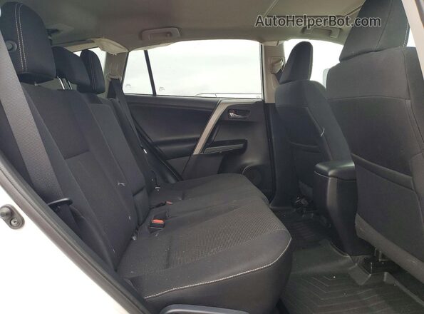 2T3WFREV9GW249940 2016 TOYOTA RAV4 Белый Вид задней части салона