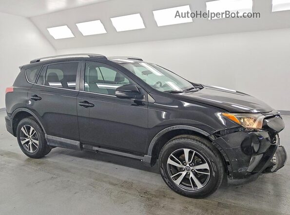 2T3WFREV9GW278001 2016 TOYOTA RAV4 Black Front right