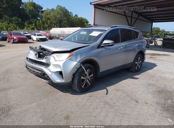 2T3WFREV9GW283876 2016 TOYOTA RAV4 Silver Vista tres cuartos delantera izquierda