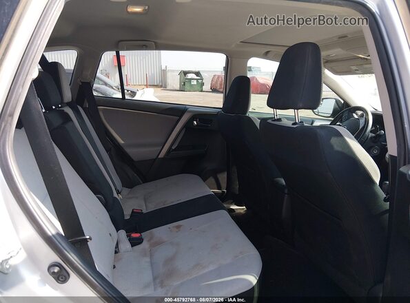 2T3WFREV9GW283876 2016 TOYOTA RAV4 Silver Vista de la etiqueta del VIN