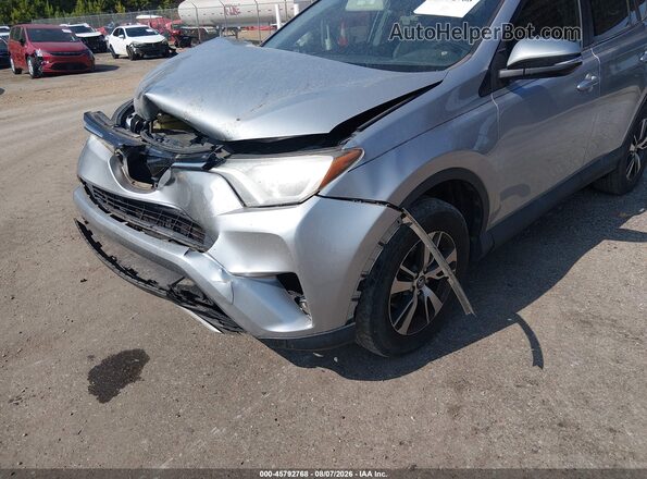 2T3WFREV9GW283876 2016 TOYOTA RAV4 Silver Vista frontal