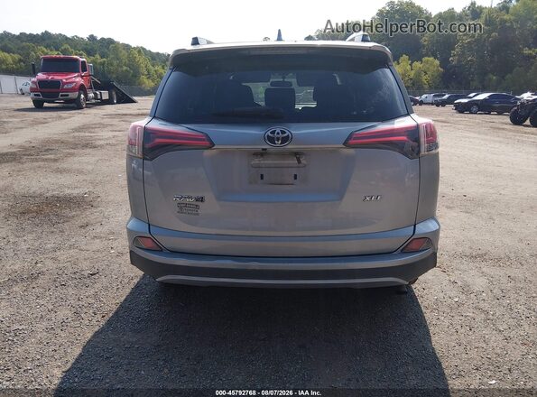 2T3WFREV9GW283876 2016 TOYOTA RAV4 Silver 