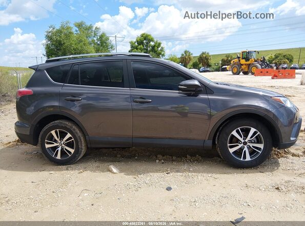 2T3WFREV9HW314951 2017 TOYOTA RAV4 Gray Widok wnętrza z tyłu