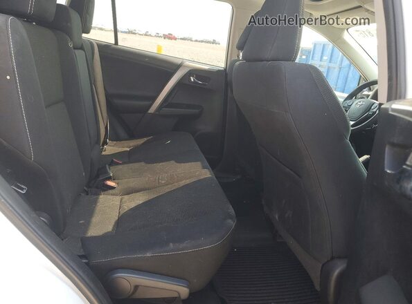 2T3WFREV9HW393733 2017 TOYOTA RAV4 White Vista interior trasera
