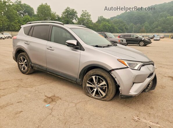 2T3WFREV9JW414294 2018 TOYOTA RAV4 Silver Delantero derecho
