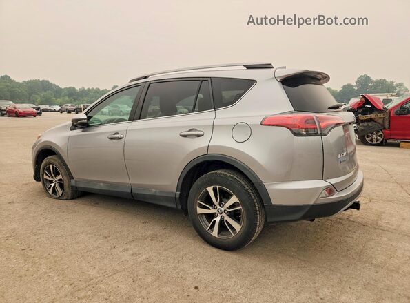 2T3WFREV9JW414294 2018 TOYOTA RAV4 Silver Trasero izquierdo
