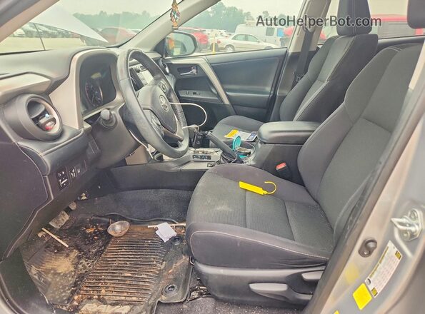 2T3WFREV9JW414294 2018 TOYOTA RAV4 Silver Vista interior delantera