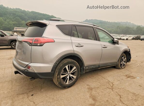 2T3WFREV9JW414294 2018 TOYOTA RAV4 Silver Trasero derecho
