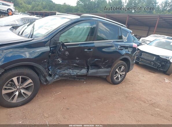 2T3WFREV9JW507266 2018 TOYOTA RAV4 Blue Սալոնի հետևի տեսք