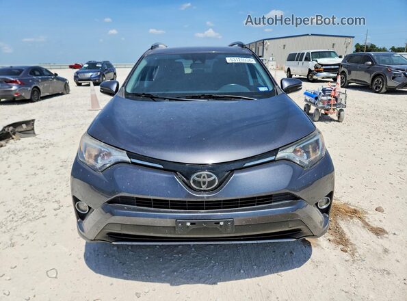 2T3WFREV9JW509003 2018 TOYOTA RAV4 Gray Դիմացի տեսք