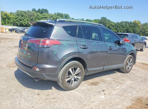 2T3WFREV9JW516145 2018 TOYOTA RAV4 Gray Rear right