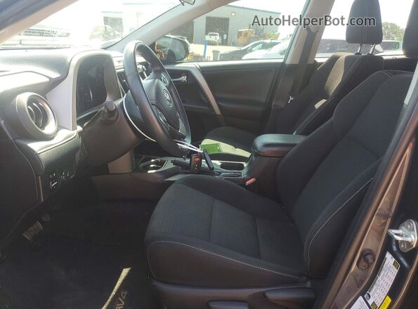 2T3WFREV9JW516145 2018 TOYOTA RAV4 Gray Front interior view
