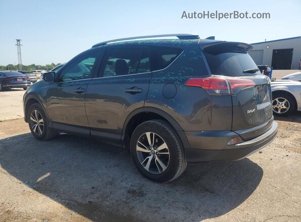 2T3WFREV9JW516145 2018 TOYOTA RAV4 Gray Rear left