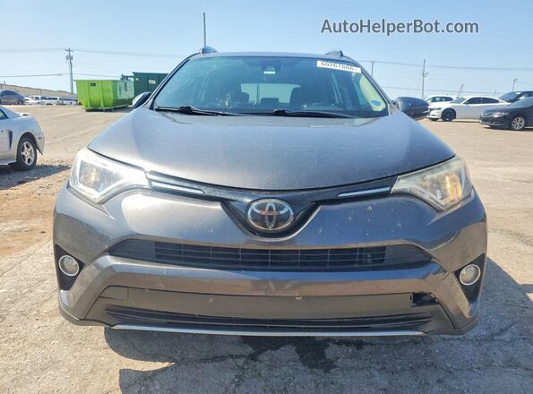 2T3WFREV9JW516145 2018 TOYOTA RAV4 Gray Front view