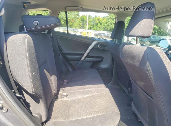 2T3WFREV9JW516145 2018 TOYOTA RAV4 Gray Rear interior view