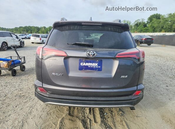 2T3WFREVXHW398858 2017 TOYOTA RAV4 Gray უკანა ხედი