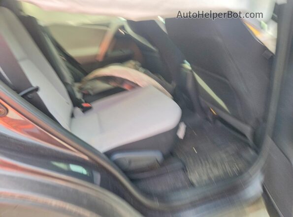 2T3WFREVXHW398858 2017 TOYOTA RAV4 Gray უკანა სალონის ხედი
