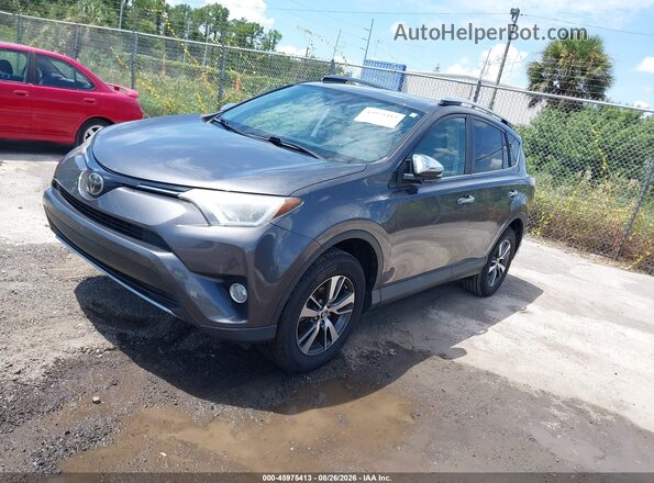 2T3WFREVXJW520186 2018 TOYOTA RAV4 Серый Передняя левая четверть