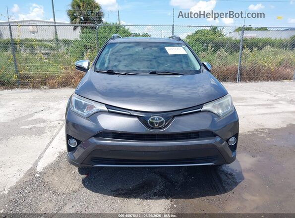 2T3WFREVXJW520186 2018 TOYOTA RAV4 Серый Вид спереди
