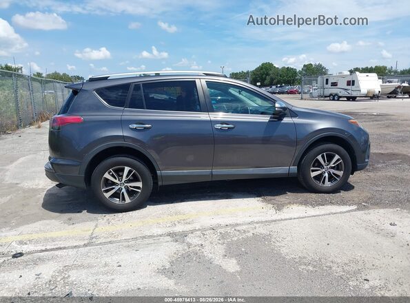2T3WFREVXJW520186 2018 TOYOTA RAV4 Серый Вид задней части салона