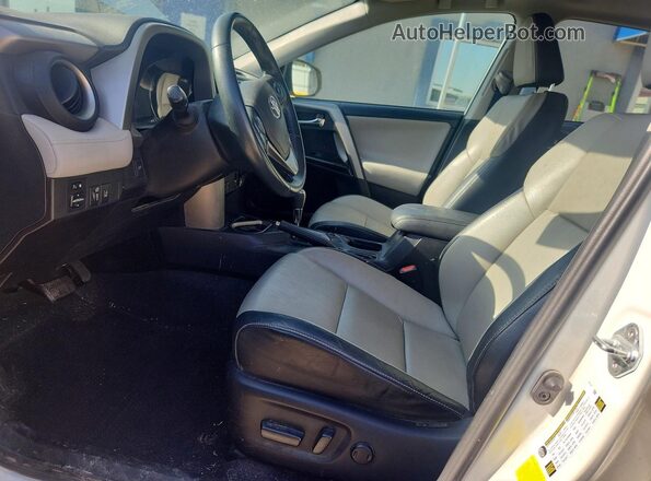 2T3YFREV0GW273780 2016 TOYOTA RAV4 White Front interior view