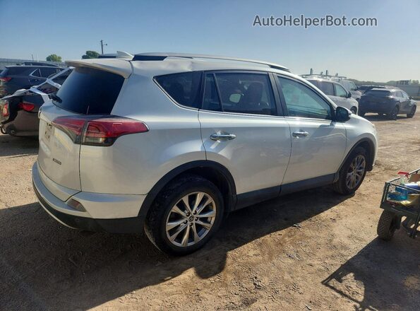 2T3YFREV0GW273780 2016 TOYOTA RAV4 White Rear right