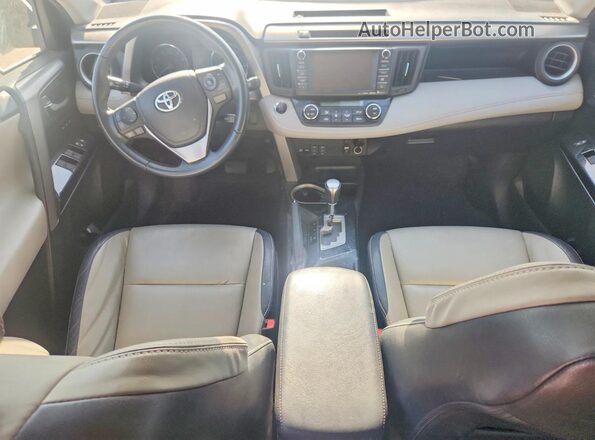 2T3YFREV0GW273780 2016 TOYOTA RAV4 White Dashboard view