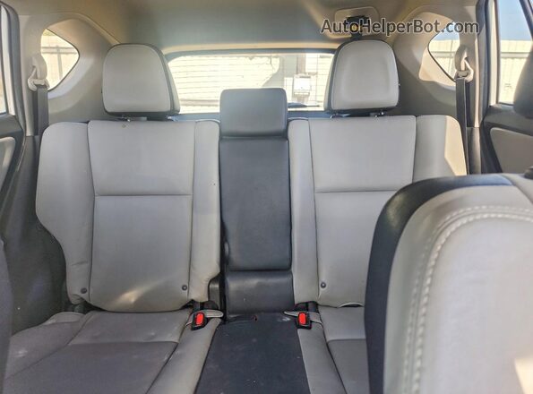 2T3YFREV0GW273780 2016 TOYOTA RAV4 White Rear seats view