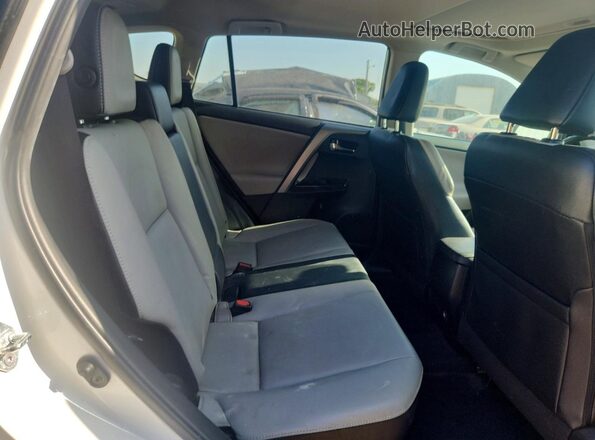 2T3YFREV0GW273780 2016 TOYOTA RAV4 White Rear interior view