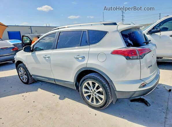 2T3YFREV2JW435819 2018 TOYOTA RAV4 White Rear left