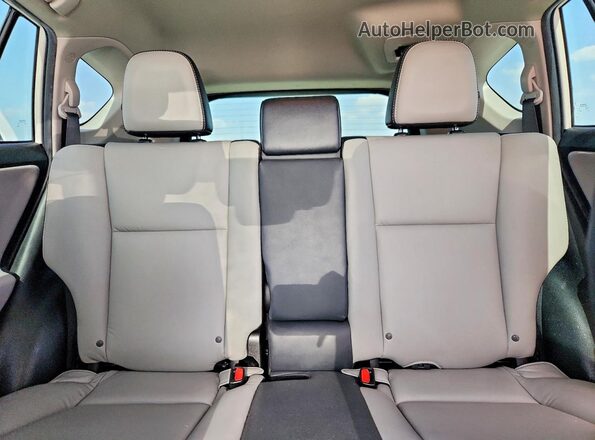 2T3YFREV2JW435819 2018 TOYOTA RAV4 White Rear seats view
