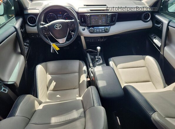 2T3YFREV2JW435819 2018 TOYOTA RAV4 White Dashboard view
