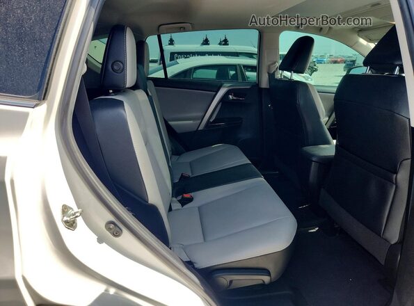 2T3YFREV2JW435819 2018 TOYOTA RAV4 White Rear interior view