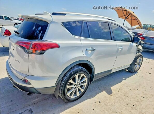 2T3YFREV2JW435819 2018 TOYOTA RAV4 White Rear right