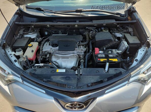 2T3YFREV4HW325929 2017 TOYOTA RAV4 Silver Rear interior view