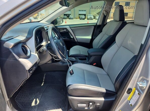 2T3YFREV4HW325929 2017 TOYOTA RAV4 Silver Front interior view