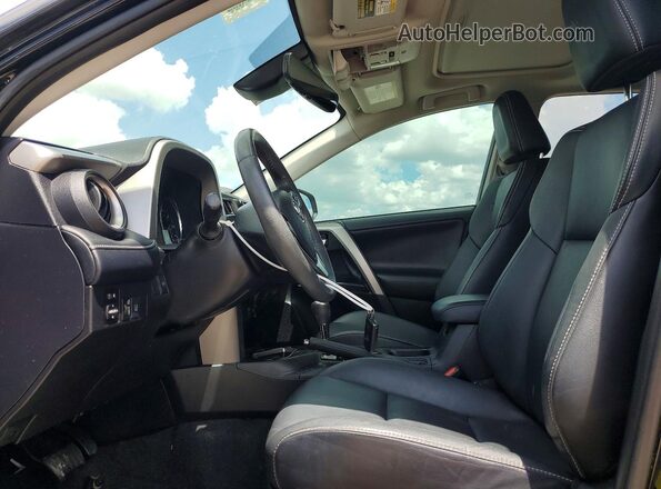 2T3YFREV6HW402669 2017 TOYOTA RAV4 Black Widok wnętrza z przodu