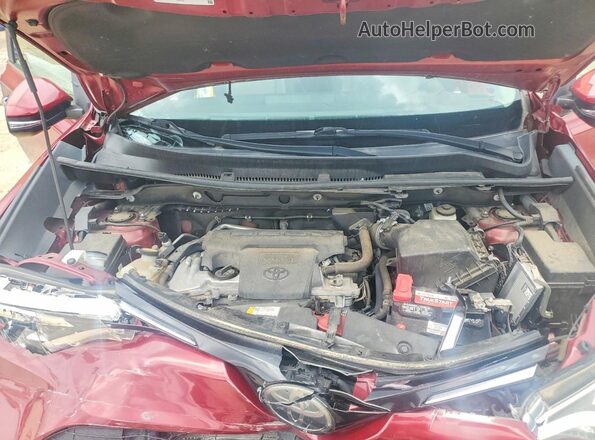 2T3YFREV6JW414231 2018 TOYOTA RAV4 Red Vista interior trasera