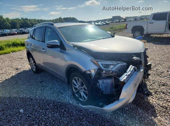 2T3YFREV7GW245491 2016 TOYOTA RAV4 Серебряный Передняя правая четверть