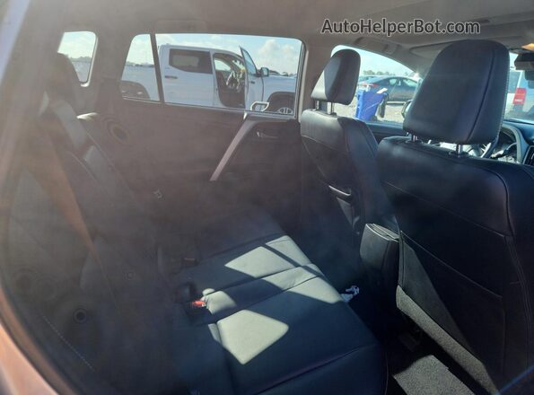 2T3YFREV7GW245491 2016 TOYOTA RAV4 Серебряный Вид задней части салона