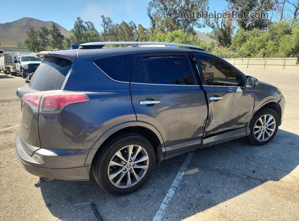 2T3YFREV7HW329084 2017 TOYOTA RAV4 Gray Tył prawy