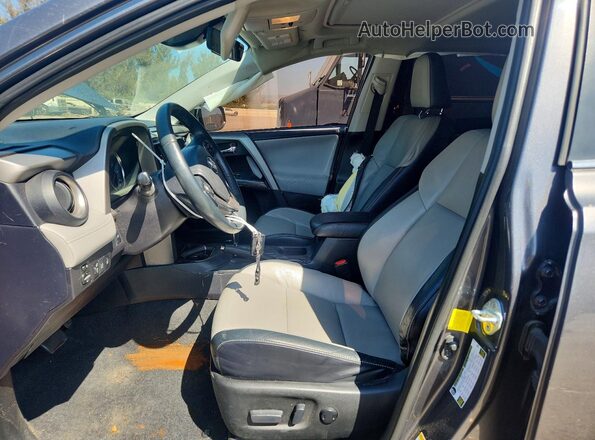 2T3YFREV7HW329084 2017 TOYOTA RAV4 Gray Widok wnętrza z przodu