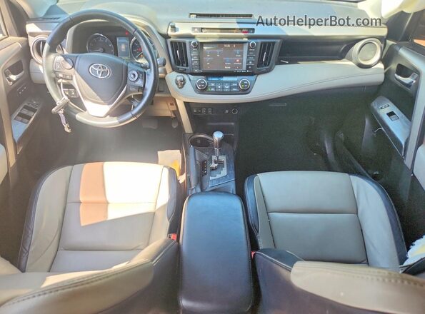 2T3YFREV7HW329084 2017 TOYOTA RAV4 Gray Widok deski rozdzielczej