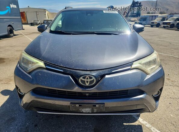 2T3YFREV7HW329084 2017 TOYOTA RAV4 Gray Widok z przodu
